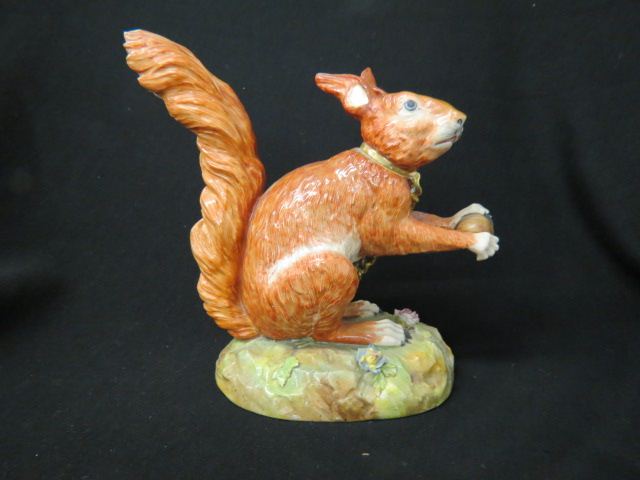 Appraisal: Meissen Porcelain Figurine of a Squirrel holding an acorn with