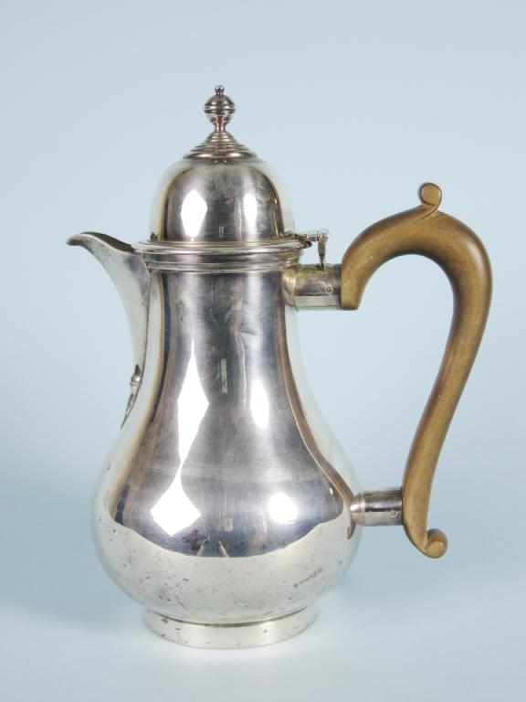 Appraisal: A George V baluster Hot Water Jug with domed lid