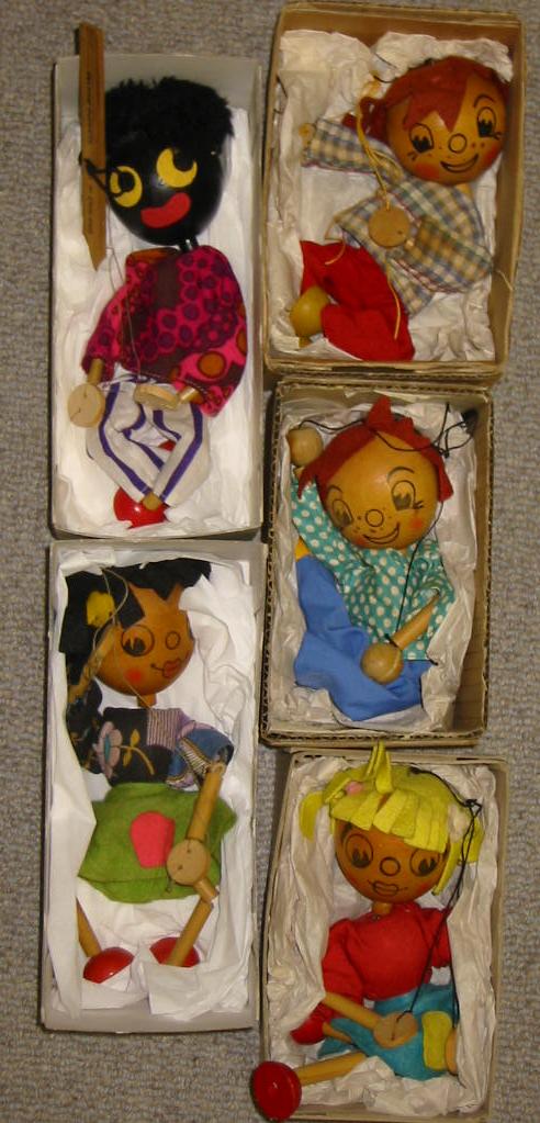 Appraisal: Five Pelham WH puppets all wooden heads two boys two