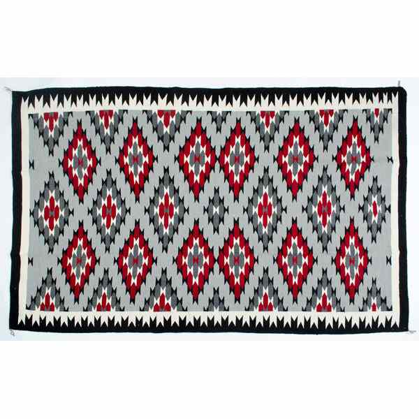 Appraisal: Kehasbah Yazzie Navajo Weaving finely woven with large serrated diamonds