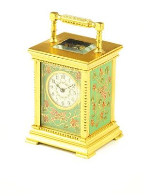 Appraisal: A French miniature gilt brass and champleve enamel carriage clock