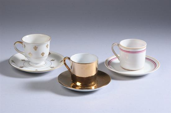 Appraisal: THREE PORCELAIN DEMITASSE SETS Including one Continental gilt service cups