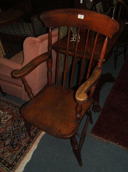 Appraisal: A Victorian ash and elm spindle back Windsor open armchair