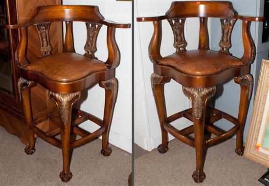 Appraisal: Pair of Chippendale style giltwood and mahogany upholstered bar stools