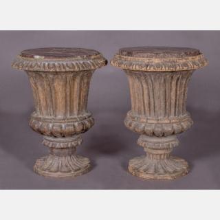 Appraisal: A Pair of Carved Hardwood Urn Form Side Tables with