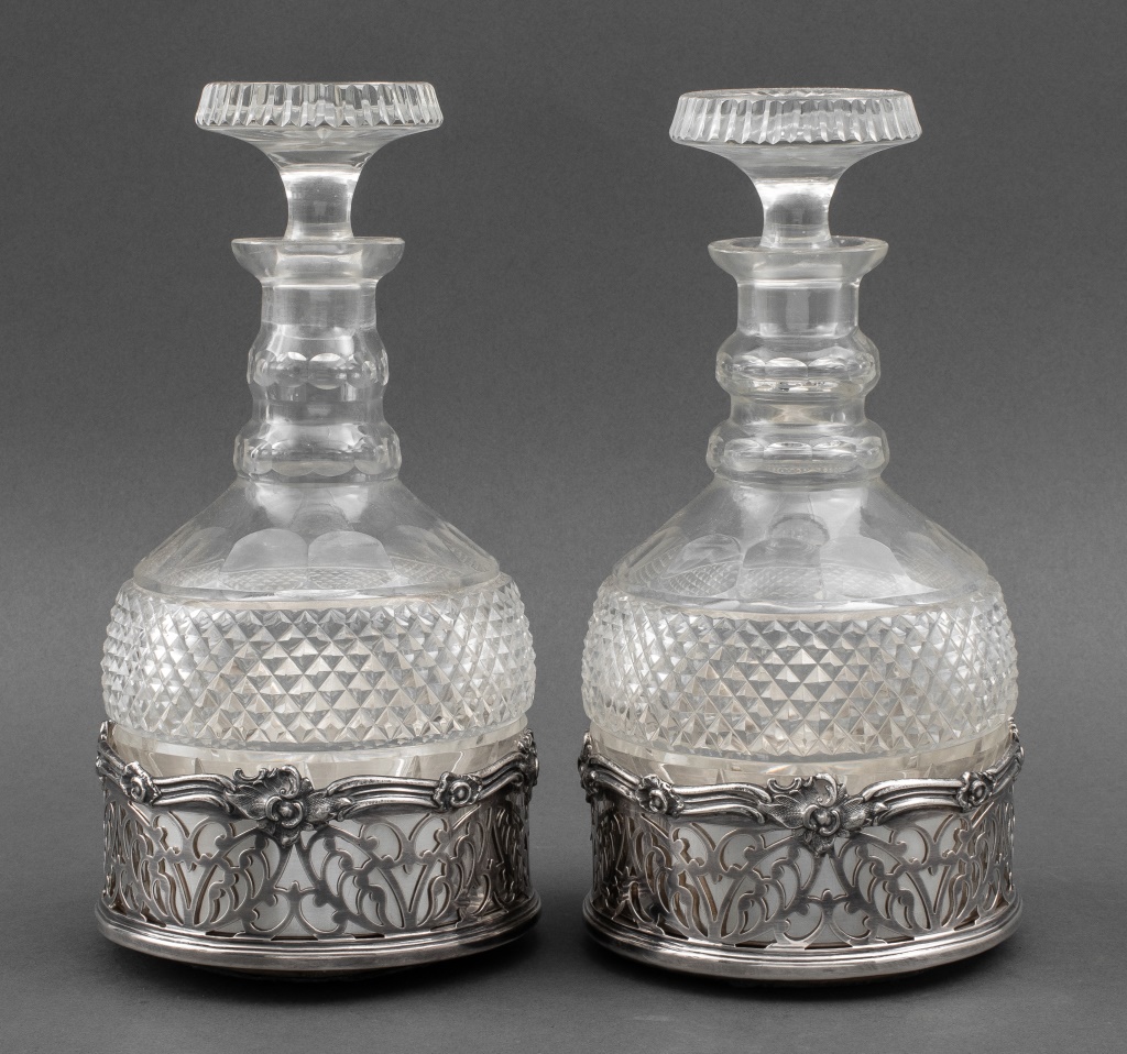 Appraisal: LATE REGENCY CUT-GLASS DECANTERS Late Regency cut-glass stoppered decanters two