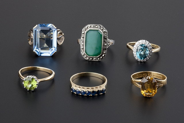 Appraisal: A collection of gem set rings comprising a blue zircon