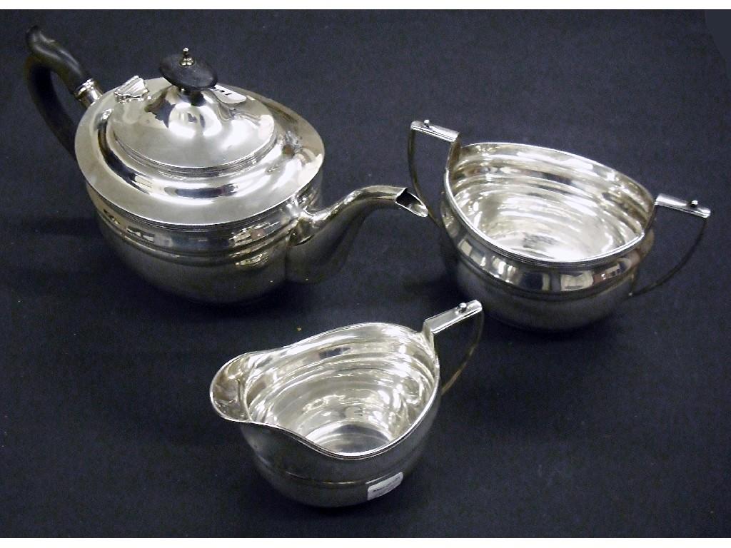 Appraisal: Good Edwardian three piece tea service of boat shaped form