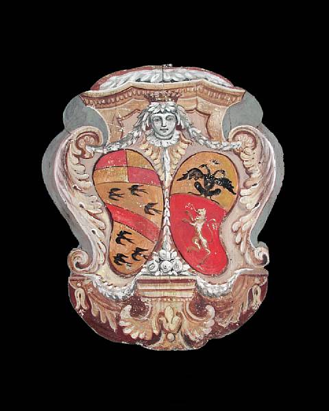 Appraisal: An Italian Baroque style polychrome cartouche form panel The central