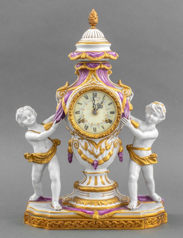 Appraisal: FRENCH ROCOCO STYLE PORCELAIN MANTEL CLOCK French Rococo style porcelain