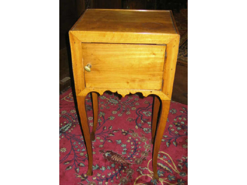 Appraisal: FRENCH SINGLE DOOR COMMODE Cut out handle grips resting on