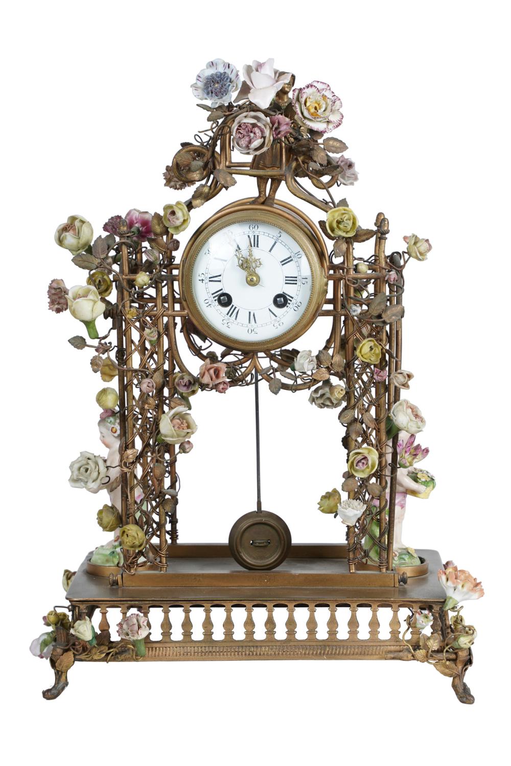 Appraisal: PORCELAIN MOUNTED GILT METAL MANTEL CLOCKCondition with several porcelain elements