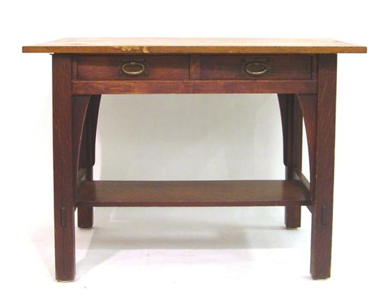 Appraisal: Gustav Stickley oak library table with two short drawers and