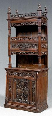 Appraisal: French Gothic carved oak cabinet oak throughout removable cornice with