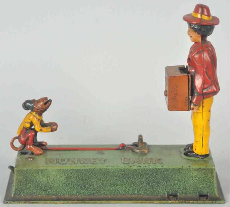 Appraisal: Cast Iron Monkey Mechanical Bank Manufactured by Hubley Manufacturing Co