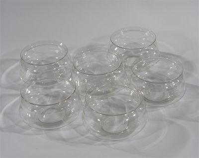 Appraisal: Ten Powell Whitefriars flint glass finger bowls designed by T