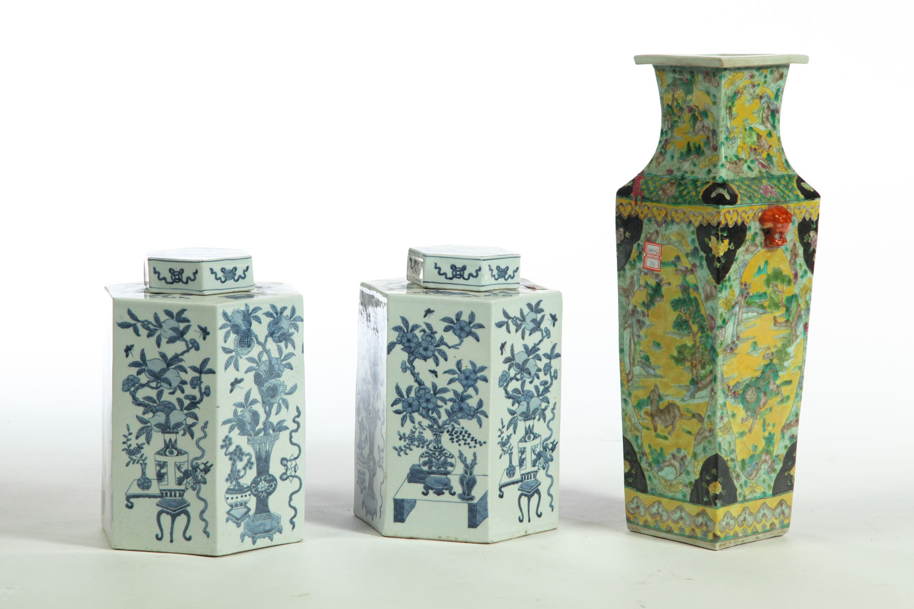 Appraisal: VASE AND PAIR OF TEA CANISTERS China th century Famille