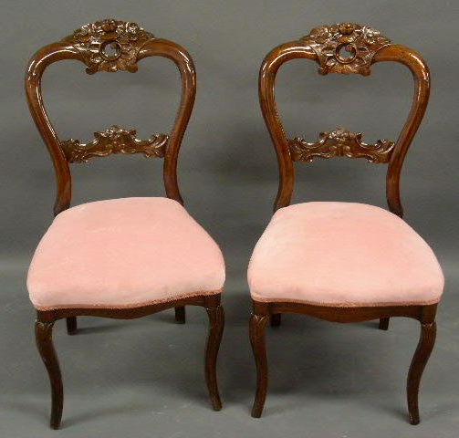 Appraisal: Pair of Victorian carved walnut side chairs h x w