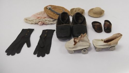 Appraisal: A pair of dolls' roller skates a pair of leather