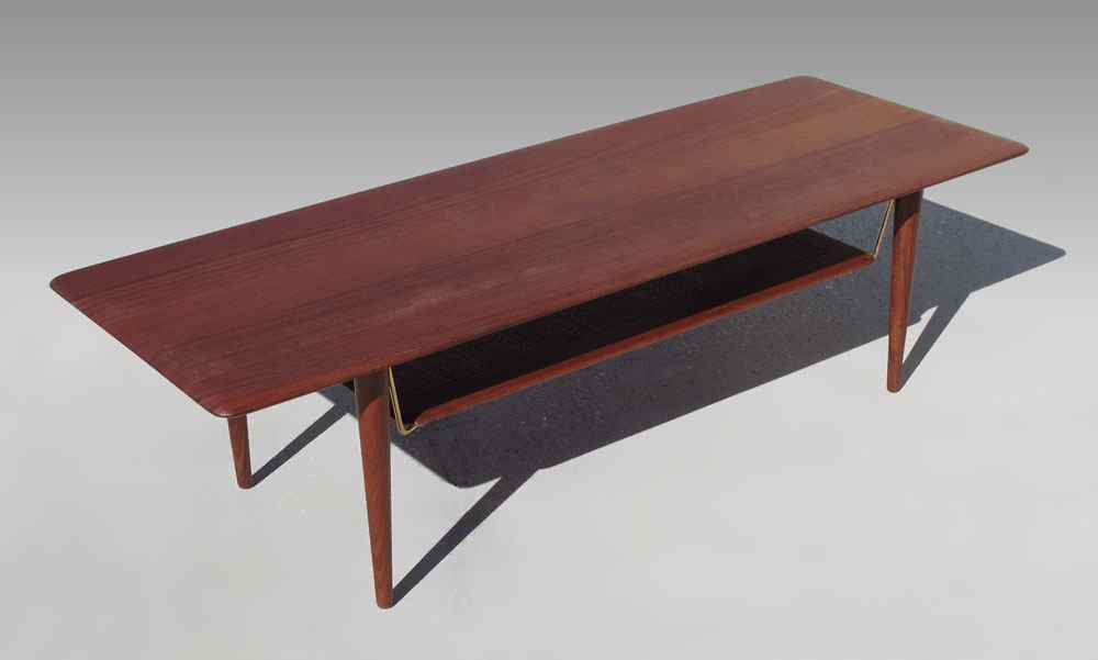 Appraisal: FRANCE SON DANISH MODERN COFFEE TABLE Rectangular table with ''floating''