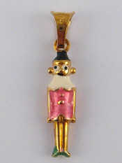 Appraisal: A yellow metal tests carat gold and enamel pendant charm