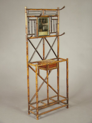 Appraisal: A bamboo simulated hall stand with central rectangular plate together