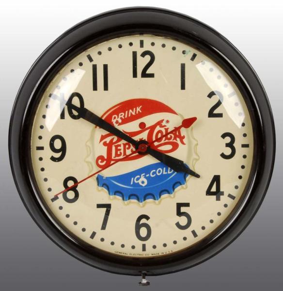 Appraisal: Electric Pepsi-Cola Bottle Cap Advertising Clock Description Working Condition Excellent