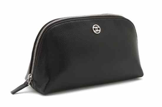 Appraisal: A Chanel Black Caviar Leather Cosmetic Case silvertone logo at