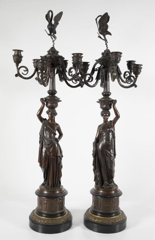 Appraisal: Pair of antique bronze figural candelabra Bases signed LVE Robert