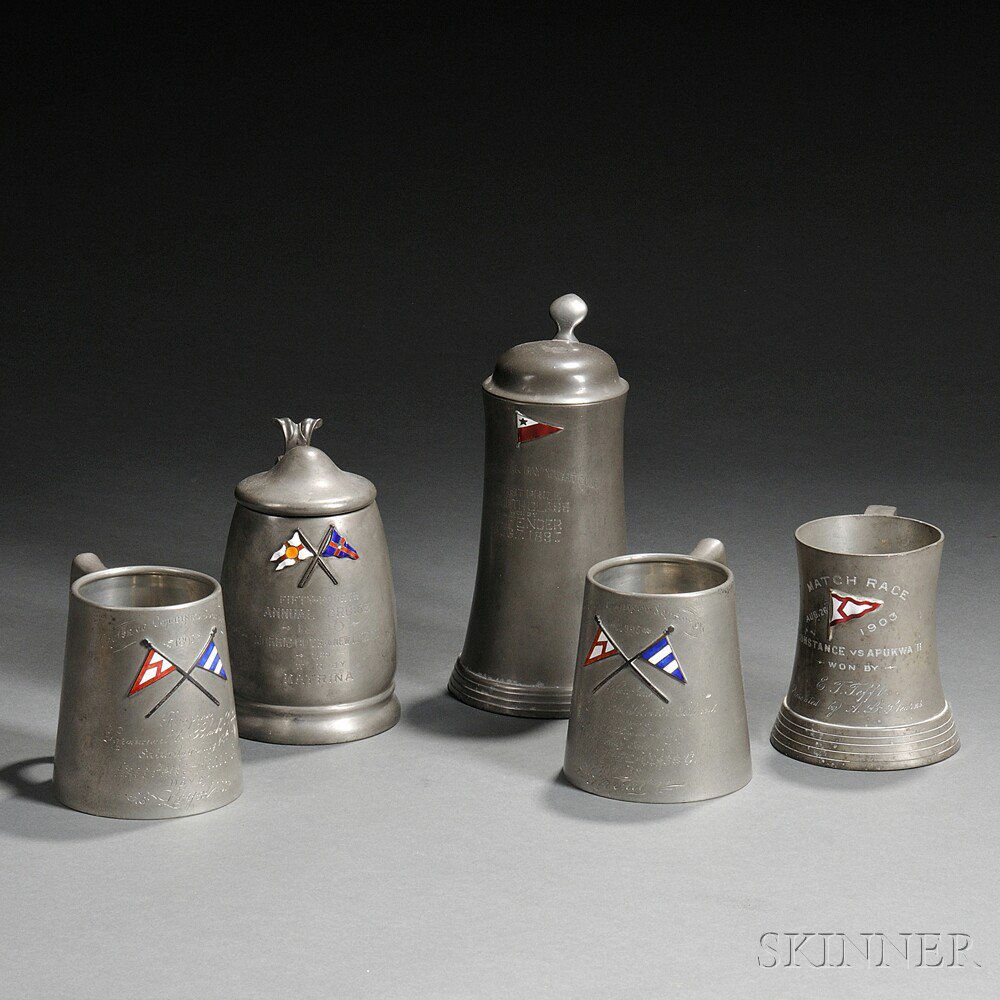 Appraisal: Five Pewter Yachting Trophies c each with an enameled burgee