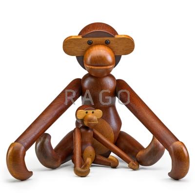 Appraisal: KAY BOJESEN Two teak monkeys Denmark s Larger stamped KAY