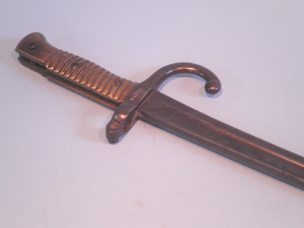 Appraisal: An early thC bayonet with a brass handle cm long