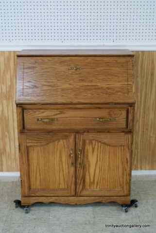 Appraisal: Oak Drop Front Secretary - Desk UnitFrom an estate produced