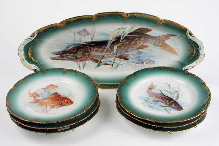 Appraisal: A SEVEN PIECE LIMOGES BASSETT AUSTRIA PORCELAIN FISH SET having