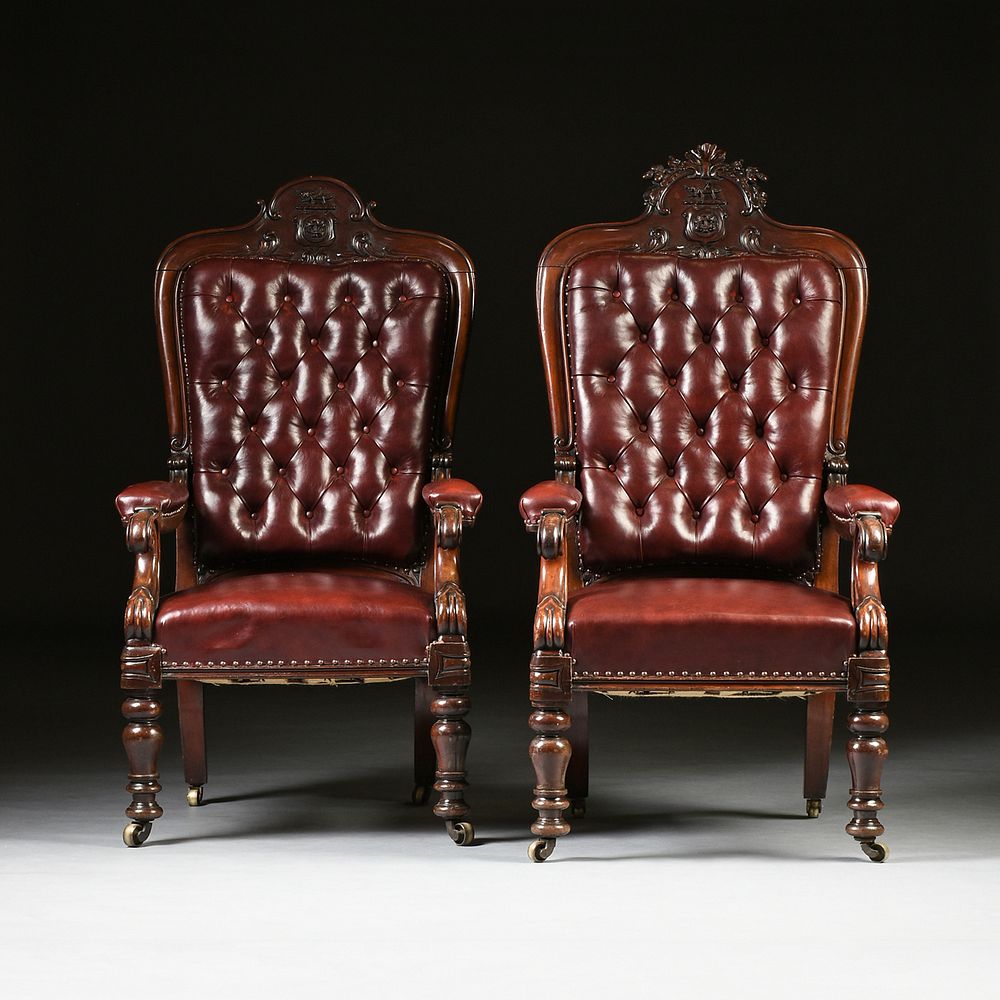 Appraisal: A PAIR OF EARLY VICTORIAN TUFTED LEATHER MAHOGANY LEATHER ARMCHAIRS