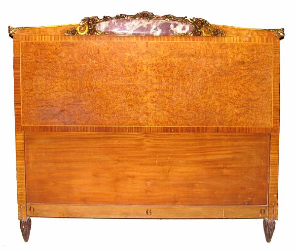 Appraisal: A French Art Deco burlwood and marble mounted bed height