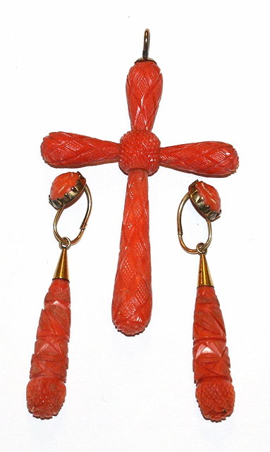 Appraisal: A PAIR OF VICTORIAN CARVED CORAL DROP EARRINGS long and