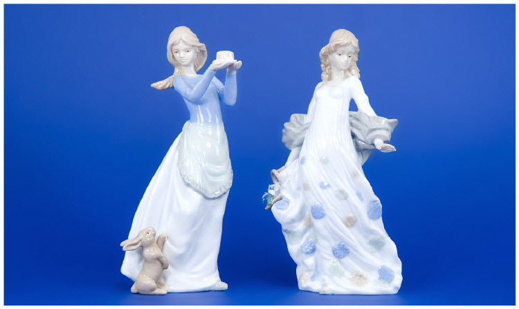 Appraisal: Ceramic Figures of Young Women in total Marks to Base