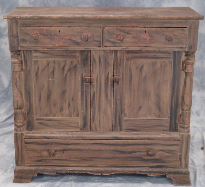 Appraisal: Smoke grained pine jelly cupboard turned columns drawer in base