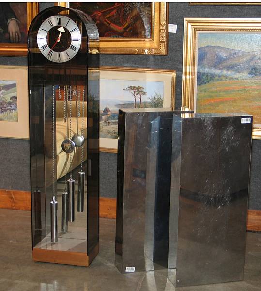 Appraisal: A Contemporary lucite floor clock together with a room divider