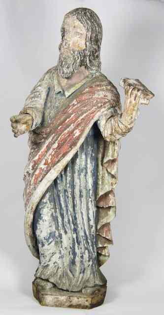 Appraisal: An th Century carved and painted figure of Christ holding