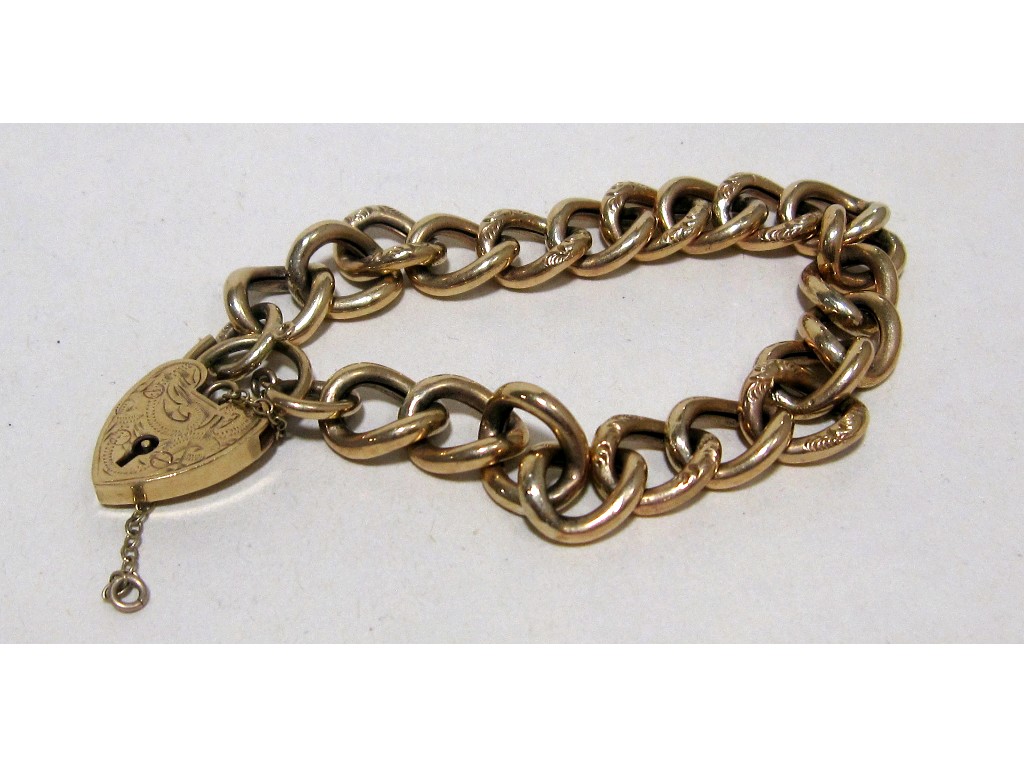 Appraisal: Nine carat gold curb link bracelet each alternate link with