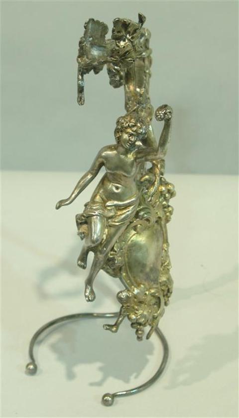 Appraisal: SILVER PLATED WINE POURER With scantily clad nymph blank cartouche