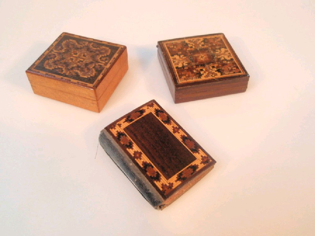 Appraisal: A Tangram puzzle box with Tunbridge ware tesserae mosaic cover