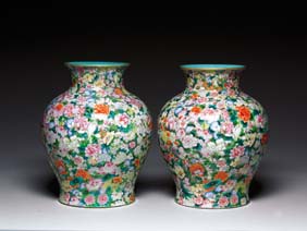 Appraisal: PAIR MASSIVE CHINESE PORCELAIN URNS Pair of beautifully and elaborately