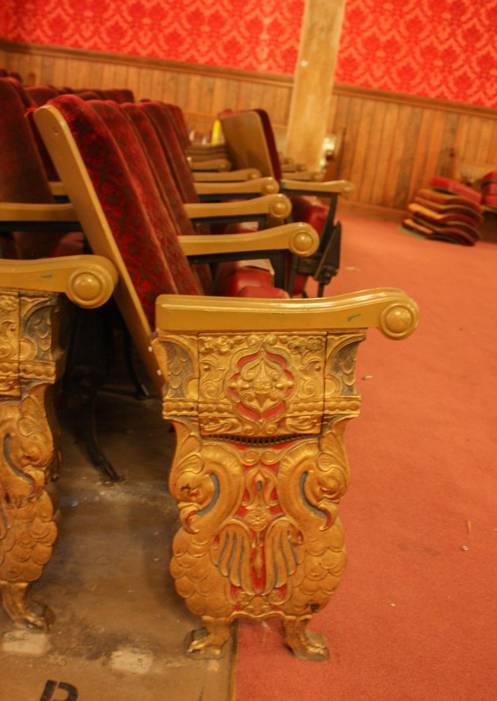 Appraisal: A ROW OF NINE VINTAGE THEATER SEATS approximate length