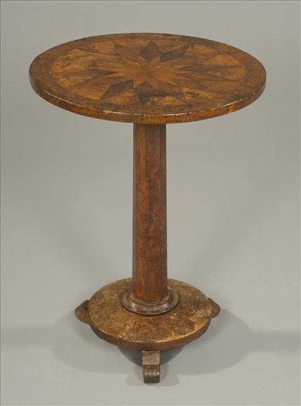 Appraisal: An early Victorian star parquetry circular occasional table circa veneered