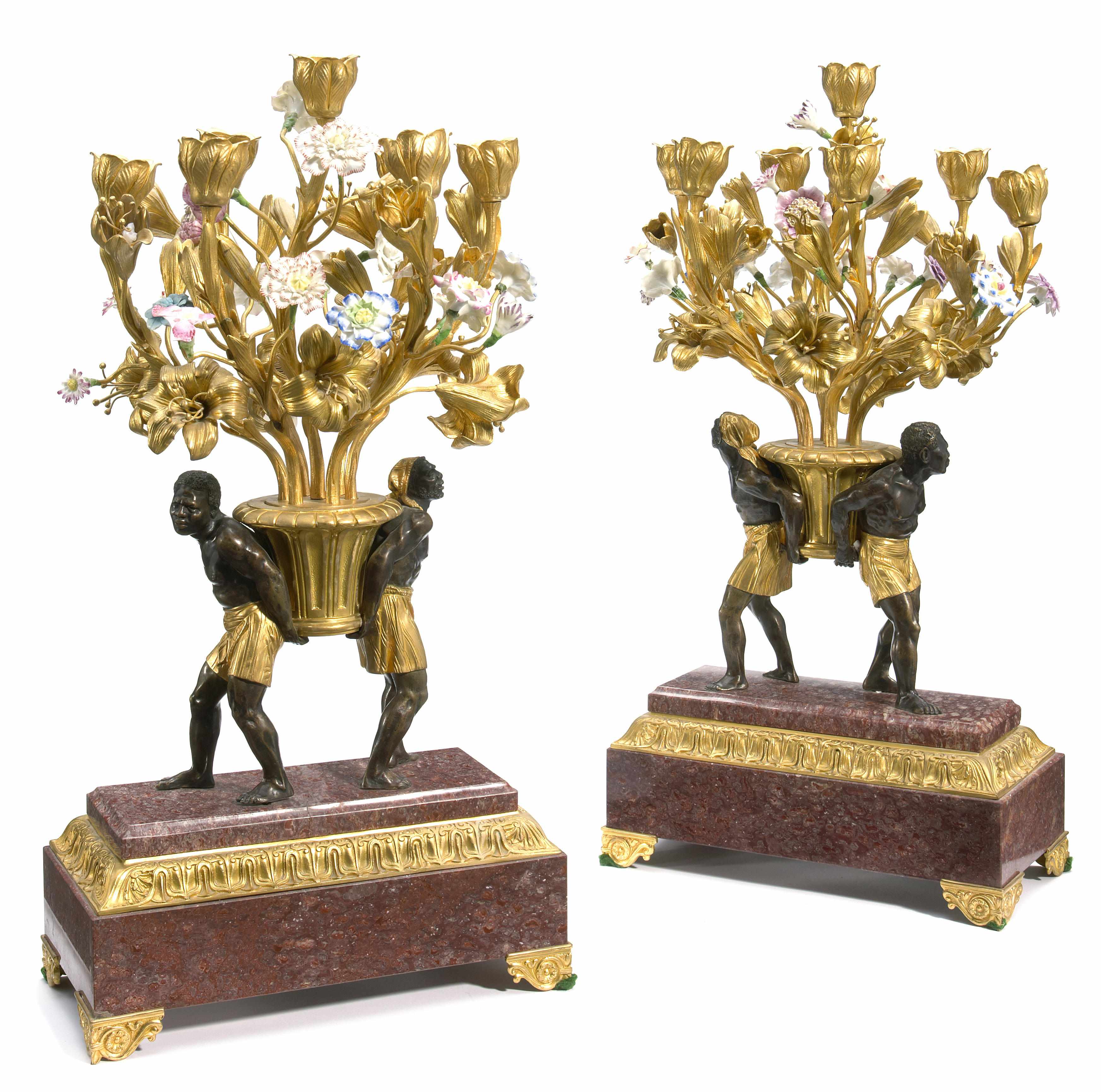 Appraisal: A pair of French gilt patinated bronze and porcelain figural