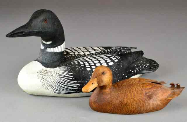 Appraisal: Pr Hand Carved Painted Duck Decoys With Glass EIncluding a