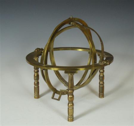 Appraisal: Scientific Interest A brass armillary sphere on three legs cm